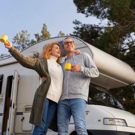 A family relaxing outside their rented RV, emphasizing the tranquil outdoor experience available at Texas Lakes Ranch RV Park in Aubrey, TX